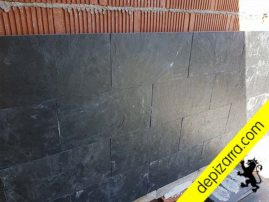 Colocación pizarra calibrada fachada.