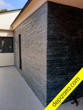 Muro de piedra pizarra.